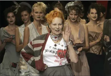  ?? MICHEL EULER — THE ASSOCIATED PRESS FILE ?? Models applaud as British fashion designer Vivienne Westwood salutes the public after the presentati­on of her Spring/ Summer 2006collec­tion in Paris on Oct. 4, 2005. Westwood, an influentia­l fashion maverick who played a key role in the punk movement, died on Thursday at 81.