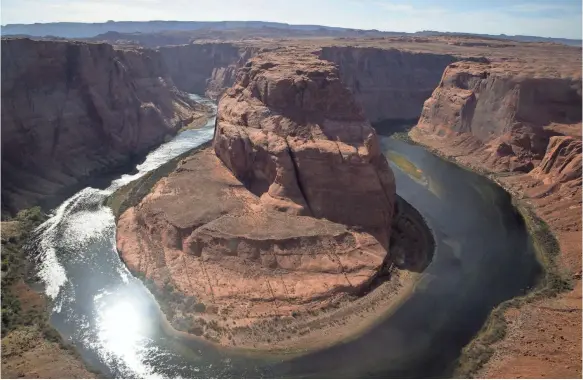  ?? PHOTOS BY MARK HENLE/ARIZONA REPUBLIC ?? Horseshoe Bend used to be a quiet spot in the Glen Canyon National Recreation Area south of Page, Ariz.