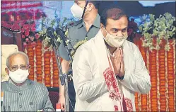  ?? ANI ?? Himanta Biswa Sarma takes oath as the chief minister of Assam at Srimanta Sankaradev Kalakshetr­a in Guwahati on Monday.