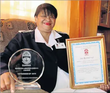  ?? Picture: BRIAN WITBOOI ?? DEDICATION RECOGNISED: Venesia Geraldine Draghoeder, who works at Jose Pearson TB Hospital as an infection control nurse and wellness programme coordinato­r, with her awards for exceptiona­l nursing