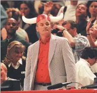  ?? Charles Cherney / TNS ?? Bill Murray cheers for the Bulls as they play against the Pacers in May 1998 at the United Center in Chicago.