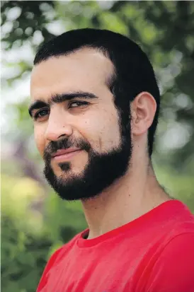  ?? COLIN PERKEL / THE CANADIAN PRESS ?? Former Guantanamo Bay prisoner Omar Khadr, 30, pictured Thursday in Mississaug­a, Ont., has reportedly received $10.5 million from the federal government.