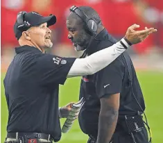  ??  ?? Dan Quinn, left, and the Falcons flopped late Sunday.