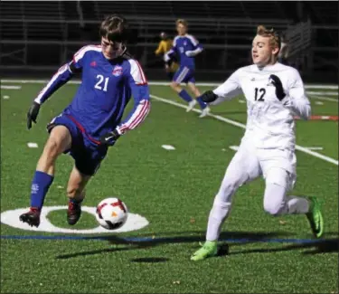  ?? RANDY MEYERS — THE MORNING JOURNAL ?? Bay’s Sam Nortz stops the ball in front of Aurora’s Cade Huffman.