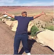  ?? JEREMY VOAS/OFFICE OF THE FEDERAL PUBLIC DEFENDER ?? Ha’im Al Matin Sharif celebrates his freedom near the Vermilion Cliffs of Arizona and Utah. He was released from Nevada’s death row thanks to research by a Tucson lawyer.