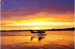  ?? Marsha Gandy/Chicago Tribune/TNS ?? ■ A seaplane lands on Lake Dora in central Florida, where flightseei­ng is a fun way to take in the views from above.