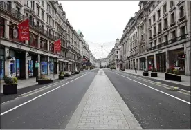  ??  ?? SHOPS SHUT: A normally packed Regent Street in Central London yesterday