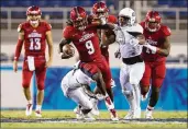  ?? ALLEN EYESTONE / THE PALM BEACH POST ?? Senior Buddy Howell’s top moment of the season came against Bethune-Cookman, when he rushed for a careerhigh 175 yards.