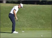  ?? DANIEL SANGJIB MIN — RICHMOND TIMES-DISPATCH ?? Mike Weir looks at his birdie putt on the 18th hole during the second round of the Dominion Energy Charity Classic in Richmond, Va., on Saturday.