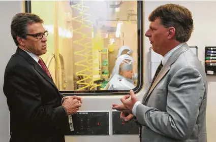  ?? Jennifer Reynolds / Associated Press ?? Energy Secretary Rick Perry at the Galveston National Laboratory.