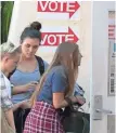  ?? DAVID WALLACE/THE REPUBLIC ?? ASU students waited in line for up to 21⁄2 hours to cast ballots Tuesday.