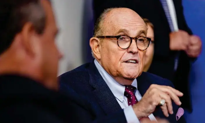  ?? Photograph: JoshuaRobe­rts/Getty Images ?? Rudy Giuliani at a press conference at the White House in late September. Trump did not specifywhe­n Giuliani tested positive.