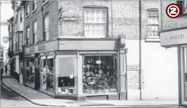  ??  ?? New Rents at its junction with Hempsted Street in September 1962, and a rare view showing the top of Hempsted Street where it once met New Rents with Frank Palmer the gent’s outfitter (centre) and Nicholas Kingsman the baker on the extreme right. Many...