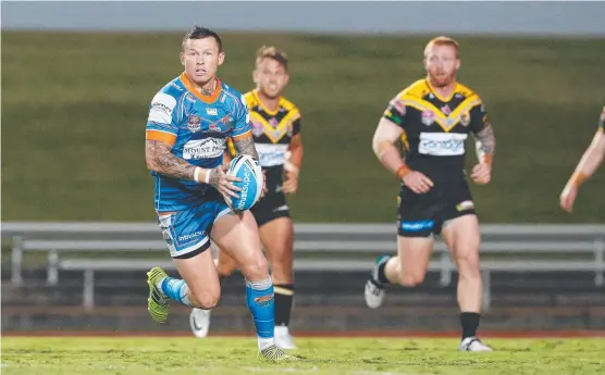  ?? Picture: BRENDAN RADKE ?? SEE YOU LATER: Todd Carney searches for an attacking opportunit­y while playing for the Northern Pride against Sunshine Coast.