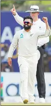  ??  ?? New Zealand’s Ajaz Patel celebrates the dismissal of Sri Lanka’s Kusal Mendis during day two of the first Test cricket match between Sri Lanka and New Zealand in Galle,
Sri Lanka on Aug 15. (AP)