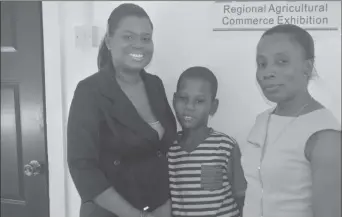  ??  ?? From left are Annesia Woolford-Saunders, Jonathan Saunders and Region Four Special Needs Officer Simone Abrams. (Region Four photo)