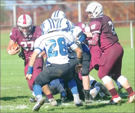  ?? Photo by Ernest A. Brown ?? Woonsocket senior running back Emmanuel Gomes (27) looks to make something happen during Saturday’s Division II quarterfin­al-round contest against Middletown at Barry Field. Gomes rushed for 270 yards as the Villa Novans punched their ticket to the semifinals with a 2414 victory over the Islanders.