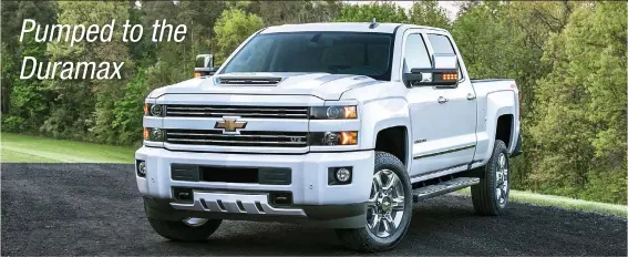  ??  ?? A menacing hood scoop helps to keep the new 6.6-liter Duramax diesel engine cool in Chevrolet’s 2500 HD pickup for 2017.