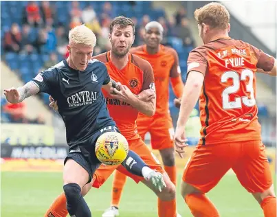  ?? SNS. ?? Lewis Toshney and Fraser Fyvie close in on Falkirk’s Craig Sibbald in the 0-0 draw in September.