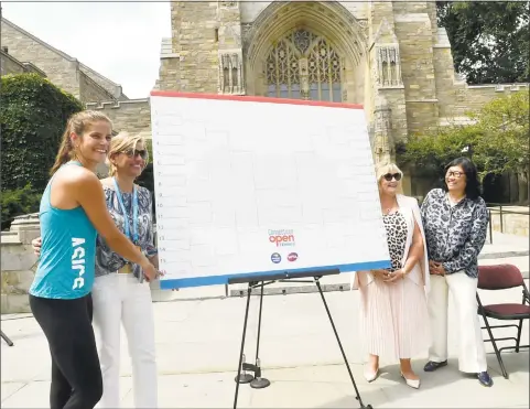  ?? Peter Hvizdak / Hearst Connecticu­t Media ?? 10th-ranked player Julia Georges, Connecticu­t Open tournament director Anne Worcester, with WTA supervisor Donna Kelso and Yale Athletic Director Victoria Chun, pose for photos during the main draw ceremony for the tennis tournament Friday at Yale’s Sterling Library.