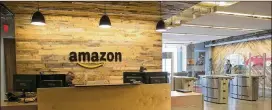  ?? DEBORAH CANNON / AMERICAN-STATESMAN 2016 ?? Amazon, whose purchase last year of Austin’s Whole Foods Market is seen as a reason to site its HQ2 here, has offices near the Domain.