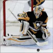  ?? KEITH SRAKOCIC — THE ASSOCIATED PRESS FILE ?? In this Oct. 7photo, Pittsburgh Penguins goalie Matt Murray (30) makes a save in the third period against the Nashville Predators during an NHL hockey game, in Pittsburgh.