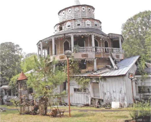  ?? THE ASSOCIATED PRESS ?? Folk artist Howard Finster’s World’s Folk Art Church in Paradise Garden.