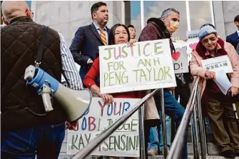  ?? Jessica Christian/The Chronicle ?? Local leaders and demonstrat­ors with San Francisco’s Asian Pacific American Community Center protest against the sentencing of Daniel Cauich to probation for a fatal stabbing in 2021.