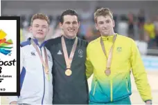  ??  ?? New Zealand’s Sam Webster (centre), Scotland’s Jack Carlin (left) and Australia’s Jacob Schmid (right) pose on the podium for their respective gold, silver and bronze medals during the medal ceremony in Brisbane on Saturday. — AFP