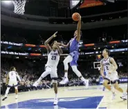  ?? MATT SLOCUM — THE ASSOCIATED PRESS ?? Creighton’s Ty-Shon Alexander (5) goes up for a shot against Villanova’s Jermaine Samuels (23) during the second half of an NCAA college basketball game, Saturday in Philadelph­ia.