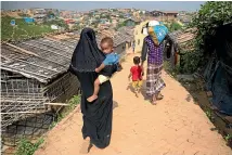  ?? AP ?? At least 700,000 Rohingya are in refugee camps in Bangladesh after fleeing what the United Nations has described as ‘‘ethnic cleansing’’, ‘‘crimes against humanity’’ and ‘‘genocide’’.