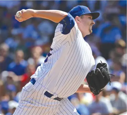  ?? | GETTY IMAGES ?? Trevor Cahill, making his first start as a Cub after contributi­ng in a relief role, dominated the Brewers in Game 1.