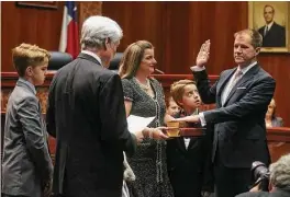  ?? John Davenport ?? Chief Justice Nathan L. Hecht administer­s the oath of office to Don Willett, right, Tuesday at the Supreme Court of Texas in Austin. President Trump nominated Willett to be a judge on the 5th U.S. Circuit Court of Appeals.