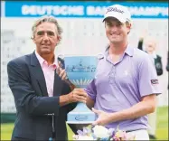  ?? Michael Dwyer / Associated Press ?? Webb Simpson, right, and former CEO of Deutsche Bank Americas Seth Waugh pose with the trophy after the final round of the Deutsche Bank Championsh­ip at TPC Boston in Norton, Mass., in 2011. Waugh is the current chief executive of the PGA of America.