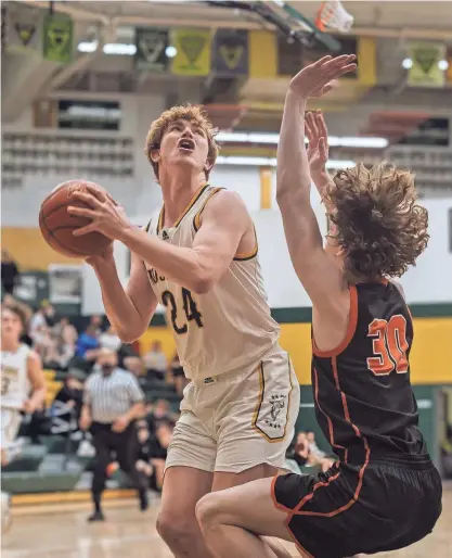  ?? MATT EHNES/JARED'S DETOURS ?? CMR's Dean Blair looks to put up a shot against Billings Senior during the regular season. Blair was named the Tribune's Male Athlete of the Winter Season after an All-State year.