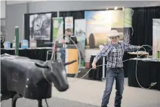  ??  ?? Young Jacob Wiebe of Taber, Alberta, hones his roping skills on Tuesday at the Canadian Western Agribition which runs until Saturday.