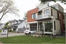  ?? BERNARD WEIL/TORONTO STAR FILE PHOTO ?? The Canadian Real Estate Associatio­n says home sales for June were down 6.7 per cent compared with May on a national basis.