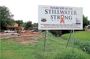  ?? [PHOTO BY MATT BARNARD, TULSA WORLD] ?? Constructi­on continues Tuesday at the Stillwater Strong Memorial near the Oklahoma State University campus in Stillwater.