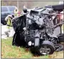  ?? TIMES photograph by Annette Beard ?? Pea Ridge Police Detective Brandon Davis photograph­s evidence at the scene of a two-vehicle crash Monday morning. Pea Ridge Police provided traffic control. Arkansas State Police investigat­ed the accident.