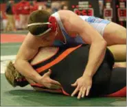  ?? STEVE HARE — THE NEWS-HERALD ?? VASJ’s Pat Sheridan wrestles during the first day of the Division III state tournament on March 8 in Columbus.