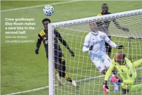  ?? GAELEN MORSE/ COLUMBUS DISPATCH ?? Crew goalkeeper Eloy Room makes a save late in the second half.