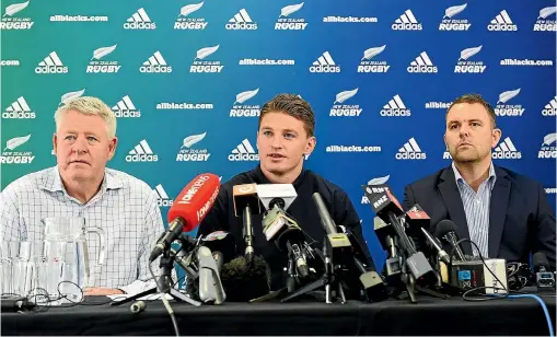  ?? PHOTO: GETTY IMAGES ?? Beauden Barrett speaks to the media after re-signing with the All Blacks and the Hurricanes. To his left is New Zealand Rugby Chief Executive Steve Tew and to his right Hurricanes Chief Executive Avan Lee.