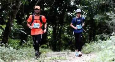  ??  ?? Vladimir Elazegui with his son, Nino, running the trails of Mapawa.