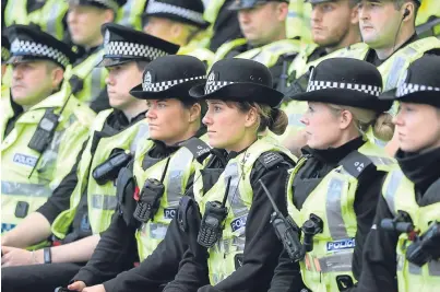  ?? Picture: Getty. ?? The “profession­alism and dedication” of rank and file officers was praised by Scotland’s justice minister amid more controvers­y as the chief constable went on “special leave”.