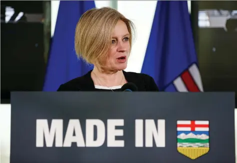  ?? IAN KUCERAK ?? Alberta Premier Rachel Notley announces her government’s rail deals with the Canadian Pacific Railway and Canadian National Railway to move more oil by rail in Edmonton on Tuesday. She said the move was necessary in order to boost prices for Canadian heavy oil.