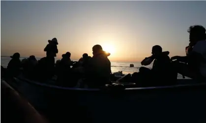  ?? Photograph: Darrin Zammit Lupi/Reuters ?? A file photo shows a group of migrants in a boat in the western Mediterran­ean Sea as Greek police say they rescued a group of naked men close to its northern border with Turkey on Friday.