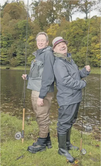  ?? PICTURE: PA PHOTO/BBC/OWL POWER/NEIL HANNA. ?? ANGLING FOR A LAUGH: Comedians and old friends Paul Whitehouse and Bob Mortimer enjoy a spot of fishing at various locations around the UK.