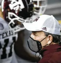  ?? Sean Rayford / Associated Press ?? Jimbo Fisher has A&M ranked No. 5 in the College Football Playoff rankings. The Aggies will next play Tennesee on Dec. 19.