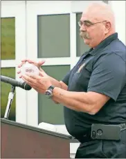  ?? / Adam Cook ?? Catoosa County Fire Chief Randy Camp explains the department’s recent grant award during the Nov. 6 Board of Commission­ers meeting.