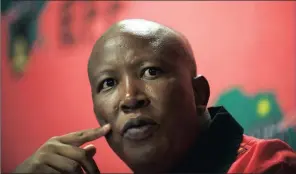  ??  ?? The EFF’s Julius Malema addresses the media on the ruling by the Constituti­onal Court ordering President Jacob Zuma to pay a portion of money spent on upgrades at his Nkandla home.